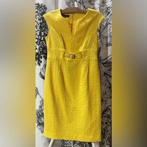Yellow sleeveless sheath dress with buckle by Jones New York. zip up back. Sz 4